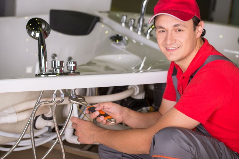 Professional Bathtub Installer at Work
